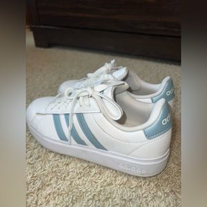 white and blue adidas women’s sneakers